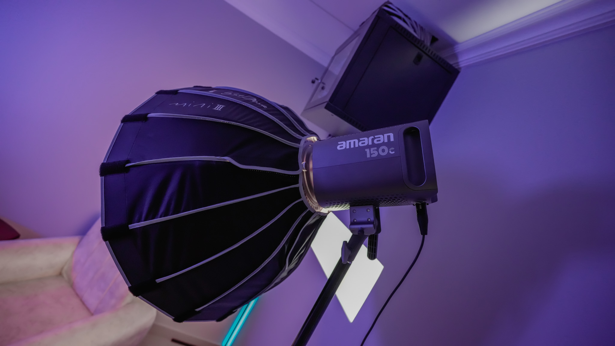 Amaran 150c LED light with lantern softbox modifier